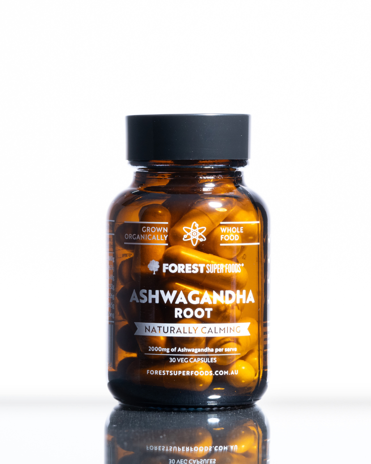 Mini Pure Ashwagandha Root Capsules bottle by Forest Super Foods with organic calming root supplement in amber jar
